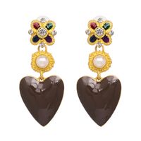 Jujia Vente Chaude Coeur Boucles D'oreilles Ornement Alliage Verre Forage Boucles D'oreilles Croix-frontière E-commerce Fournir Accessoires En Gros 51404 main image 5