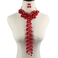 Européen Et Américain Exagérée Collier Ethnique Style Imitation Perle Multi-couche Gland Collier Croix-frontière Accessoires 9020 main image 1