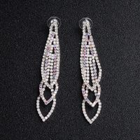 Européen Et Américain Dames Quotidiennes Boucle D'oreille Accessoires Brillant Strass Incrusté Gland Boucles D'oreilles Griffe Chaîne Auriculaire Aiguille Croix-frontière Fournir main image 6