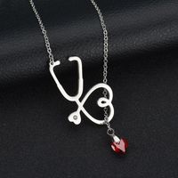 Souhaite Vente Chaude Populaire Ornement De Mode Amour Médecin Infirmière Stéthoscope Pendentif Collier Croix-frontière E-commerce Bijoux main image 1