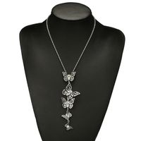 Ornement Europe Et En Amérique Croix Frontière Taille Papillon Creux Alliage Rétro Mode Et Personnalisé Pendentif Longue Diamant-clouté Collier main image 3