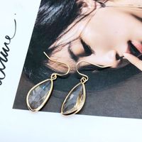 Hersteller Liefern Japanische Und Koreanische Weiße Transparente Kristall Ohrringe, Minimalist Ische Ohrringe, All-match-accessoires, Ohrringe sku image 1