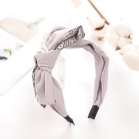 2021 Japonais Et Coréen Nouveau Simple Contraste Couleur Grand Arc Bandeau Rétro Large-à Larges Bords Se Laver Le Visage Bande De Cheveux Mignon Cheveux Accessoires main image 3