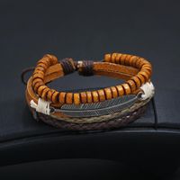 Vintage Multilayer Alloy Feather Cowhide New Wood Bead Bracelet main image 4