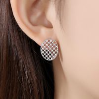 Retro Hollow Copper Inlaid Zirconium Stud Earrings main image 3