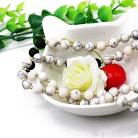 Hersteller Liefern Europäische Und Amerikanische Perlen Halskette Weiße Perlen Schwarze Holzkohle Perlen Halskette Pullover Kette Weiße Faden Quasten Halskette main image 5