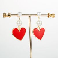 Europe Et En Amérique Croix Frontière Boucles D'oreilles Nouveau Coeur Perle Boucles D'oreilles Socialite Tir De La Rue De Mode Punk Boucles D'oreilles Pour Les Femmes main image 2