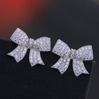 925 Silver Needle Korean Fashion Copper Micro Inlaid Zircon Bow Earrings sku image 1