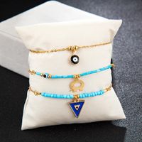 New Creative Popular Geometric Triangle Alloy Hollow Elephant Eyes Rice Beads Multilayer Anklet main image 4