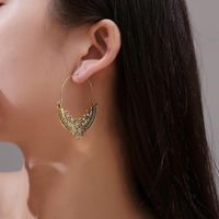 Ethnische Mode Ohrringe Antike Geschnitzte Liebe Hohle Ohrringe Weibliche Palast Stil Retro Muster Ohrringe Großhandel main image 3