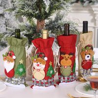 New Christmas Decorations Sackcloth Snow Cartoon Drawstring Wine Bottle Cover Lattice Doll Wine Bottle Bag Wholesale main image 3