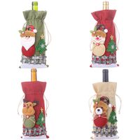 New Christmas Decorations Sackcloth Snow Cartoon Drawstring Wine Bottle Cover Lattice Doll Wine Bottle Bag Wholesale main image 6