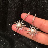 S925 Silver Korean Fashion Eight-bell Star Earrings Micro-set Zircon Luxury Pearl Sun Flower Earrings sku image 1