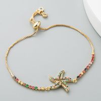 Female Copper Adjustable Creative Hollow Starfish Rainbow Inlaid Zircon Bracelet main image 3