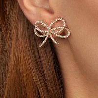 53003 Bijoux Boucles D'oreilles Généreux Et Personnalisé Coréenne Style Arc Micro-incrusté Plein-bijoux Boucles D'oreilles Européen Et Américain Approvisionnement Du Commerce Extérieur Gros sku image 5