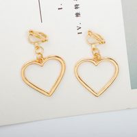 Europäische Und Amerikanische Heiß Verkaufte Hohle Pfirsich Herz Liebes Ohrringe Handgemachte Goldene Und Silberne Herzförmige Ohrringe Großhandel sku image 3