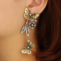 New Jewelry Retro Fashion Geometric Butterfly Leaves Flowers Alloy Long Earrings main image 3