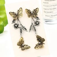 New Jewelry Retro Fashion Geometric Butterfly Leaves Flowers Alloy Long Earrings main image 4