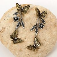 New Jewelry Retro Fashion Geometric Butterfly Leaves Flowers Alloy Long Earrings main image 5