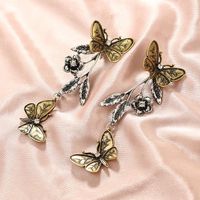 New Jewelry Retro Fashion Geometric Butterfly Leaves Flowers Alloy Long Earrings main image 6