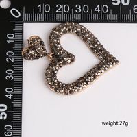 Nuevos Pendientes Simétricos En Forma De Corazón Con Micro Diamantes main image 5