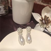 Show Style Ins Platzt Künstlich Hergestellte Wasser Tropfen Perlen Blumen Förmige Ohrringe Europäische Und Amerikanische Temperament Feen Ohrringe main image 1