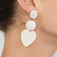 52287 Europäische Und Amerikanische Reiss Perlen Ohrringe Übertriebene Ohrringe Herzförmige Handgemachte Böhmische Kreative Reiss Perlen Weibliche Ohrringe main image 1
