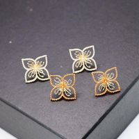 Copper Hollow Flower Millet Grain Beads Alloy Needle Stud Earrings Nhom129455 main image 1