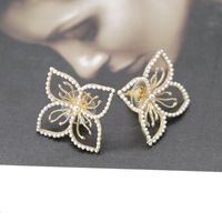 Copper Hollow Flower Millet Grain Beads Alloy Needle Stud Earrings Nhom129455 main image 8