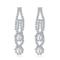 Fabrik Direkt Verkauf Neue Mode Legierung Diamant Ohrringe Europäischen Und Amerikanischen Langen Retro Hohle Perlen Ohrringe Spot main image 1