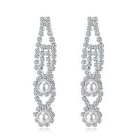 Ventes Directes D'usine Nouvelle Mode Alliage Strass Boucles D'oreilles Longues Européen Et Américain Rétro Creux Perle Boucles D'oreilles En Stock main image 1