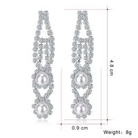 Fabrik Direkt Verkauf Neue Mode Legierung Diamant Ohrringe Europäischen Und Amerikanischen Langen Retro Hohle Perlen Ohrringe Spot main image 6