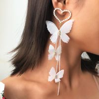 Ez2092 Croix-transfrontalier Européen Et Américain De Mode Exquis Boucles D'oreilles Romantique Aura Amour Perle Papillon Boucles D'oreilles Longues Boucles D'oreilles sku image 1