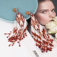 52319 Europäische Und Amerikanische Reis Perlen Ohrringe Übertriebene Ohrringe Lange Quaste Reine Hand Gefertigte Böhmische Kreative Weibliche Ohrringe main image 5