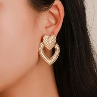 Vintage Openwork Metal Frosted Double Heart Earrings Nhdp145184 main image 1