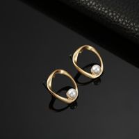 Korean Style Simple Graceful Ins Style Metal Stud Earrings Irregular With Personality Round Pearl Earrings For Women All-matching main image 5