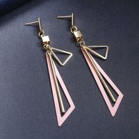 Japonais Et Coréens Simplicité Et Personnalité Géométrique Creux Boucles D'oreilles Femmes De Long Alliage Électrolytique Triangle Gland Pendentif Boucles D'oreilles main image 1