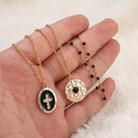 Fashion Simple Geometric Alloy Black Drop Oil Round Cross Multi-layer Necklace Nhgy140141 main image 4