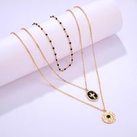 Fashion Simple Geometric Alloy Black Drop Oil Round Cross Multi-layer Necklace Nhgy140141 main image 5