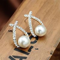 Golden Cross Pearl Flash Diamond Stud Earrings Nhpf152789 sku image 1