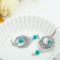 Fashion Vintage Ethnic Wind Hollow Turquoise Water Drops Tassel Earrings Nhdp148929 main image 4