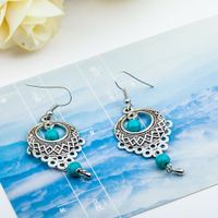 Fashion Vintage Ethnic Wind Hollow Turquoise Water Drops Tassel Earrings Nhdp148929 main image 6