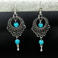Fashion Vintage Ethnic Wind Hollow Turquoise Water Drops Tassel Earrings Nhdp148929 sku image 1