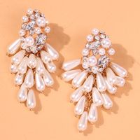 2e6839 Européen Et Américain Nouvelle Rue Tir Même Style Exagéré Personnalisé Géométrique Diamant Boucles D'oreilles Tempérament Perle Artificielle Boucles D'oreilles Femmes main image 3