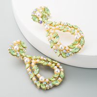 Exaggerated Hollow Drop-shaped Pearl Earrings main image 5
