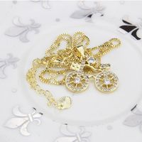 Ins Commerce Extérieur Européen Et Américain De Mode Vélo Collier  Croix-frontière Produits En Stock Nouveau Cuivre-plaqué Or Vélo Pendentif Femme main image 6