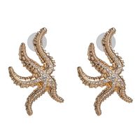 Alloy Starfish Diamond Earrings Personality Street Shooting Golden Animal Earrings sku image 1