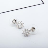 Korean Hot Sale Snowflake Earrings Female Fashion Geometric Diamond Flower Flower Earrings sku image 3