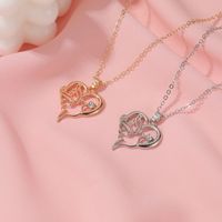 Creative Hollow Heart-shaped Peace Dove Diamond Animal Necklace main image 3