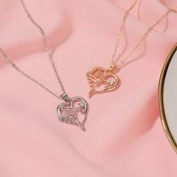 Creative Hollow Heart-shaped Peace Dove Diamond Animal Necklace main image 4